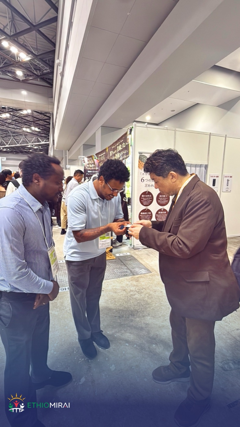 Exchanging business cards at SCAJ2026