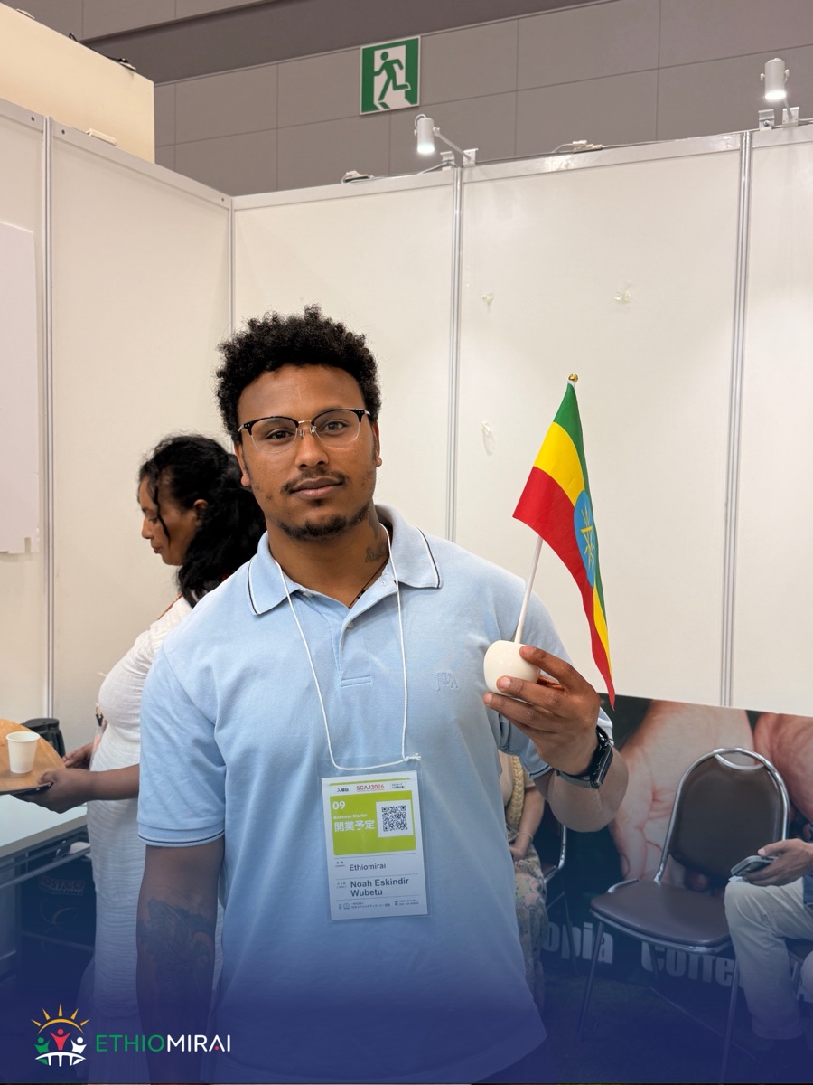 Noah Eskindir Wubetu with the Ethiopian flag at SCAJ2026